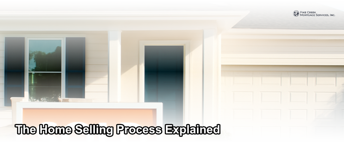 A well-staged Delaware home with a sold sign in the front yard on a sunny day