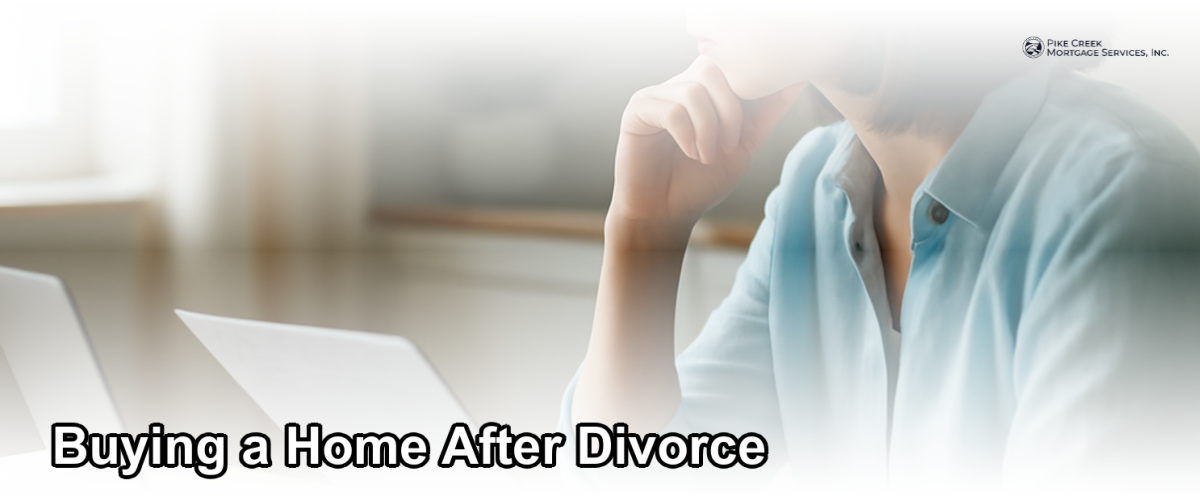 A single person reviewing mortgage documents at a clean kitchen table, symbolizing a fresh financial start after divorce
