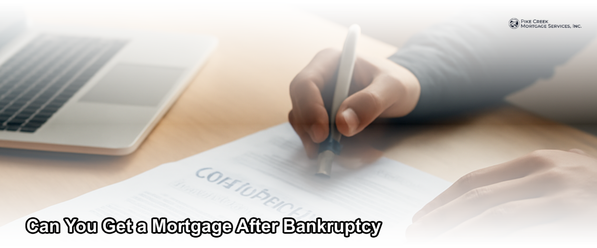 A homeowner reviewing mortgage documents at a desk, symbolizing financial recovery and the path to homeownership after bankruptcy.