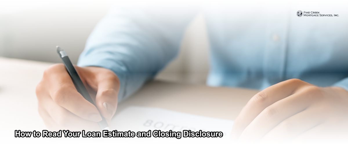 A homebuyer reviewing a Loan Estimate document at a desk with a pen and calculator in natural light