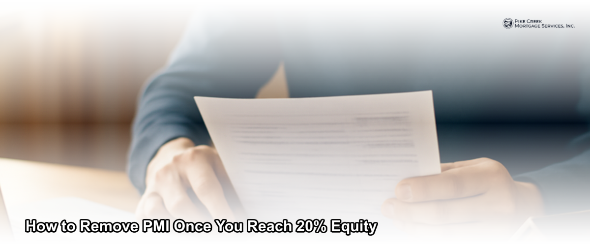 Homeowner reviewing mortgage documents at a desk, symbolizing the process of removing PMI after reaching 20% home equity