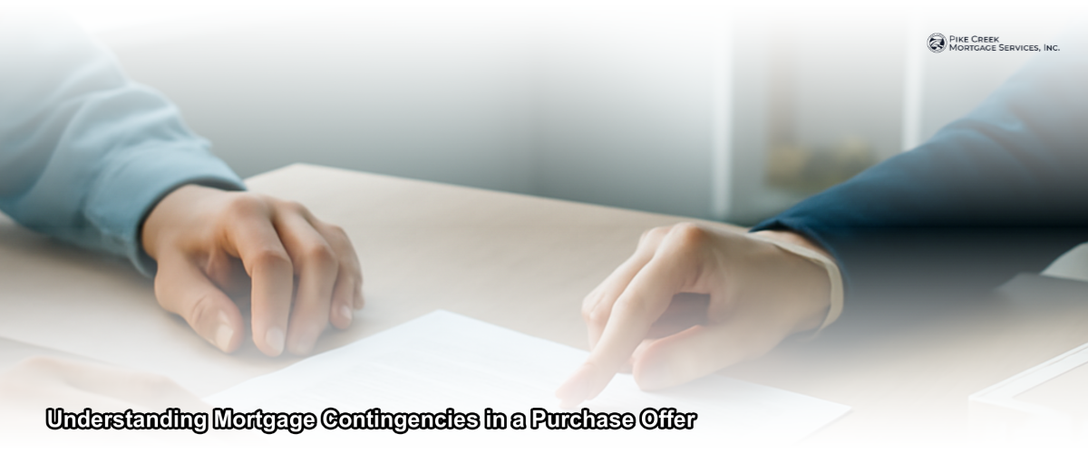 A homebuyer reviewing a purchase offer contract with a mortgage lender at a desk in a bright office setting