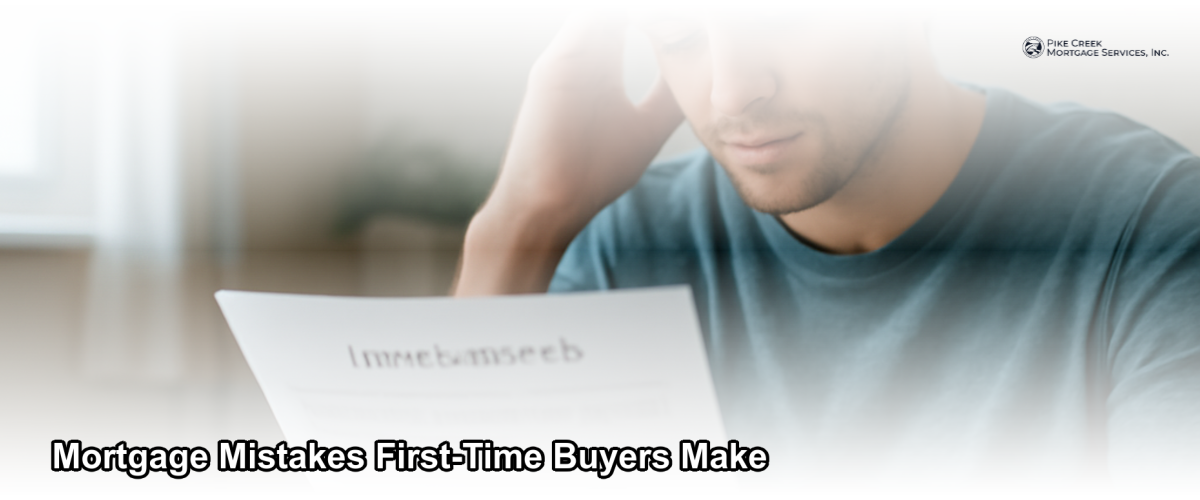 First-time homebuyer reviewing mortgage documents at a desk with a concerned expression, warm indoor lighting