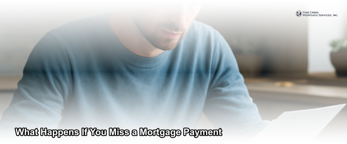 A homeowner in Newark Delaware reviewing mortgage documents with a concerned but focused expression at a kitchen table