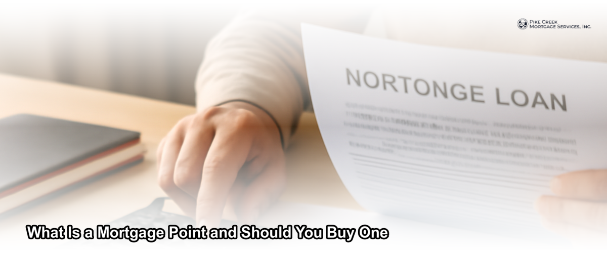 A homeowner reviewing mortgage loan documents at a desk, with a calculator and printed amortization schedule, considering whether to buy mortgage points
