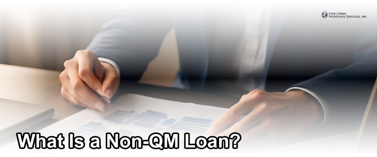 A professional reviewing mortgage documents at a desk, representing non-QM loan options for self-employed and non-traditional borrowers in Newark, Delaware