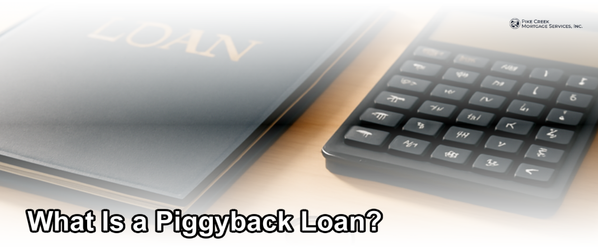 A split view of two mortgage documents side by side on a desk, representing a piggyback loan structure with a calculator and house keys nearby