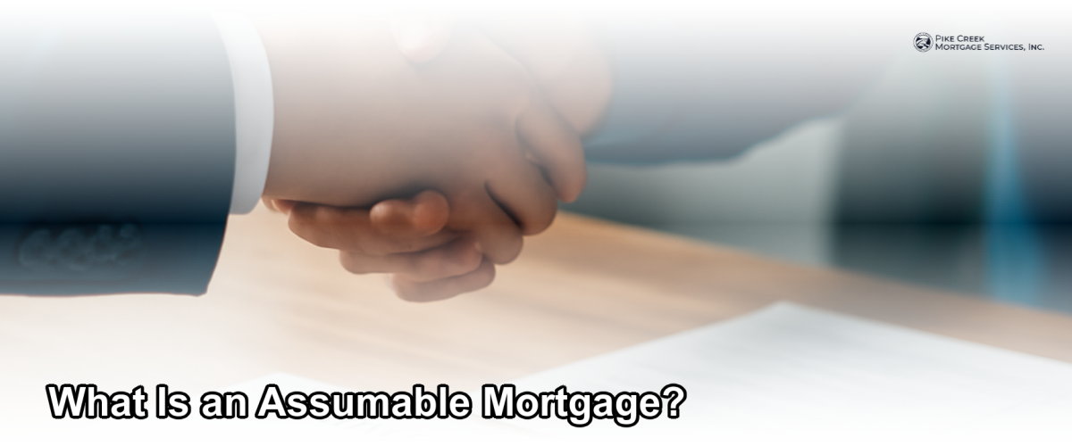 A homebuyer and seller shaking hands across a table with mortgage documents and a house key visible, representing a mortgage assumption transaction in Newark Delaware